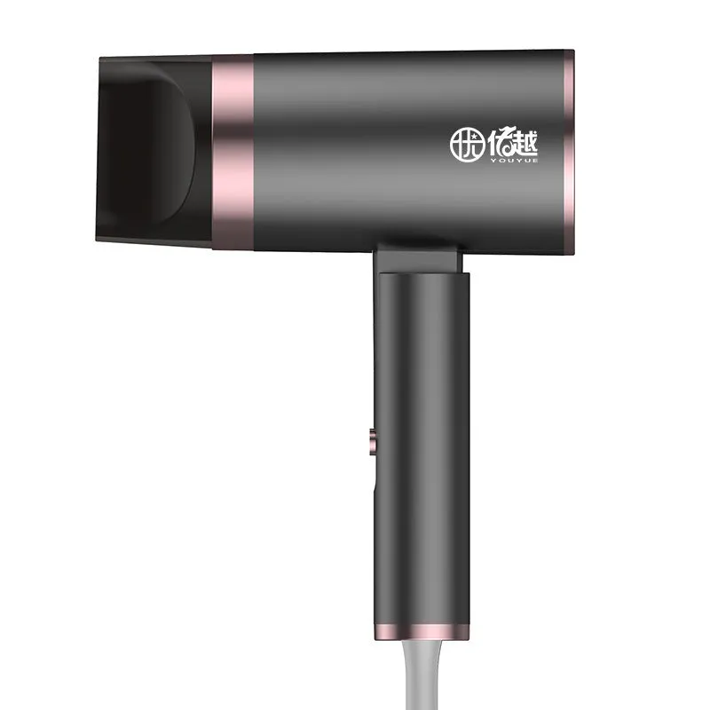 Foldable negative ion hair dryer in emerald green with folded handle and single nozzle