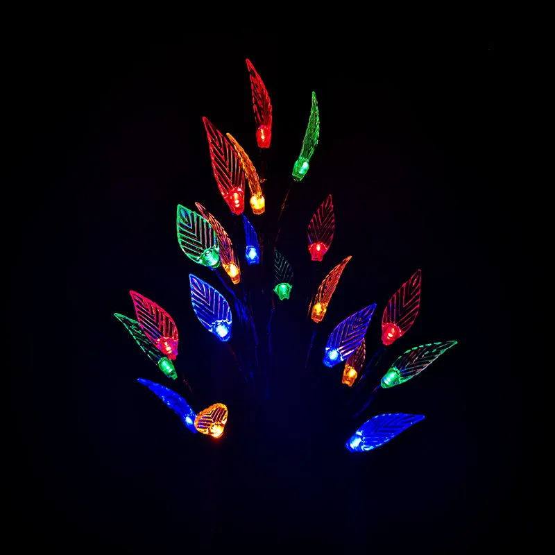 Solar-powered leaf branch garden light measuring 73cm tall with iron and plastic construction