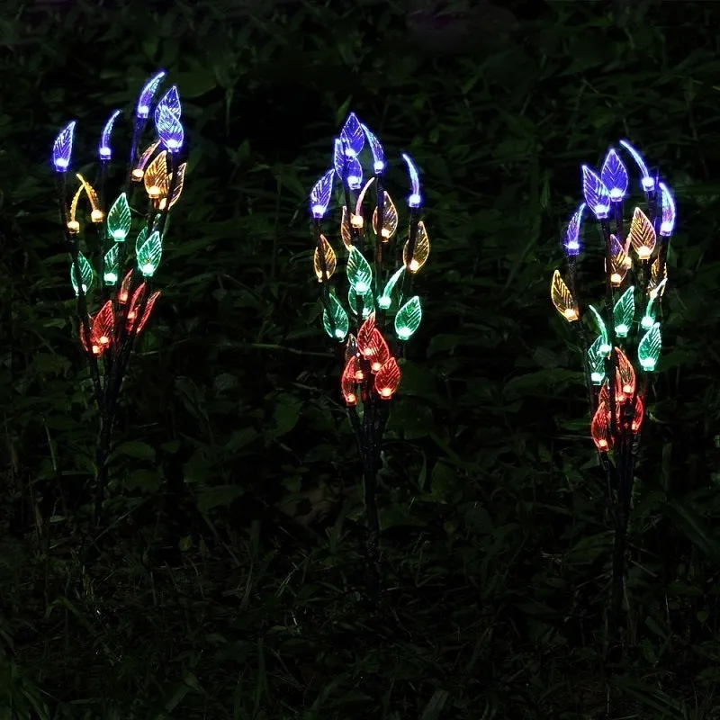 Solar-powered leaf branch garden light measuring 73cm tall with iron and plastic construction