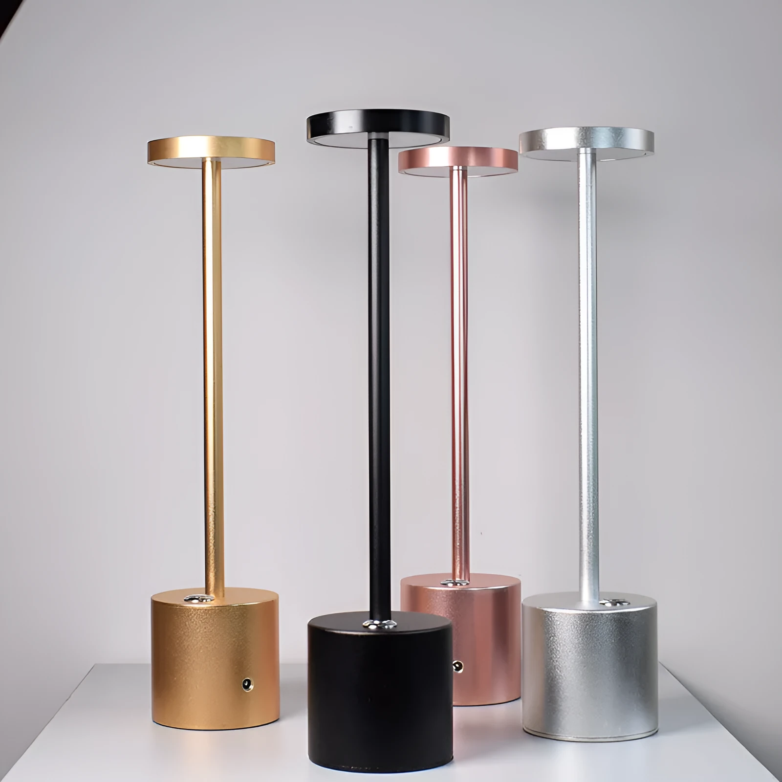 All-aluminium rechargeable LED desk lamp with touch dimming control in silver finish