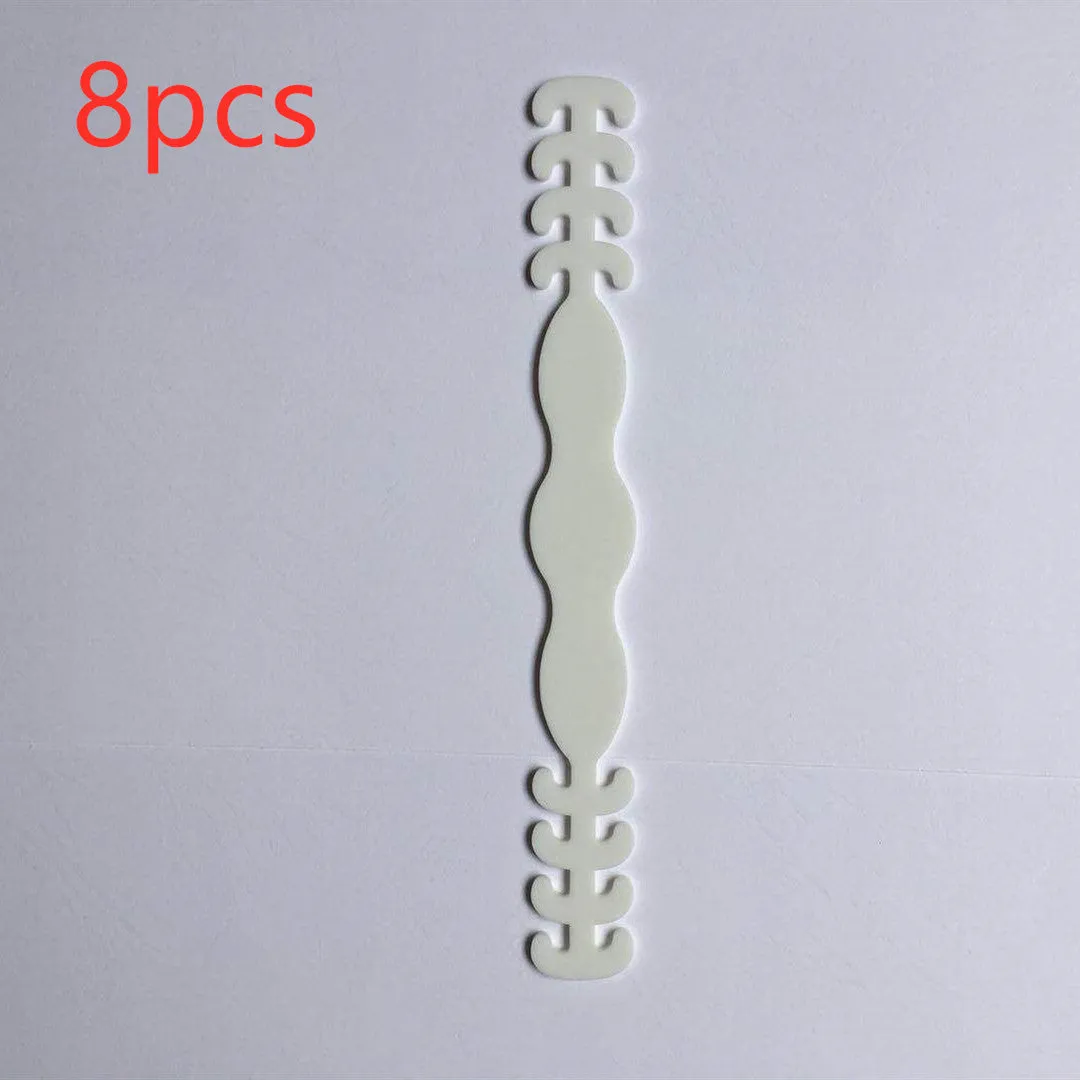 Pack of eight coloured silicone tool buckle straps on a workbench