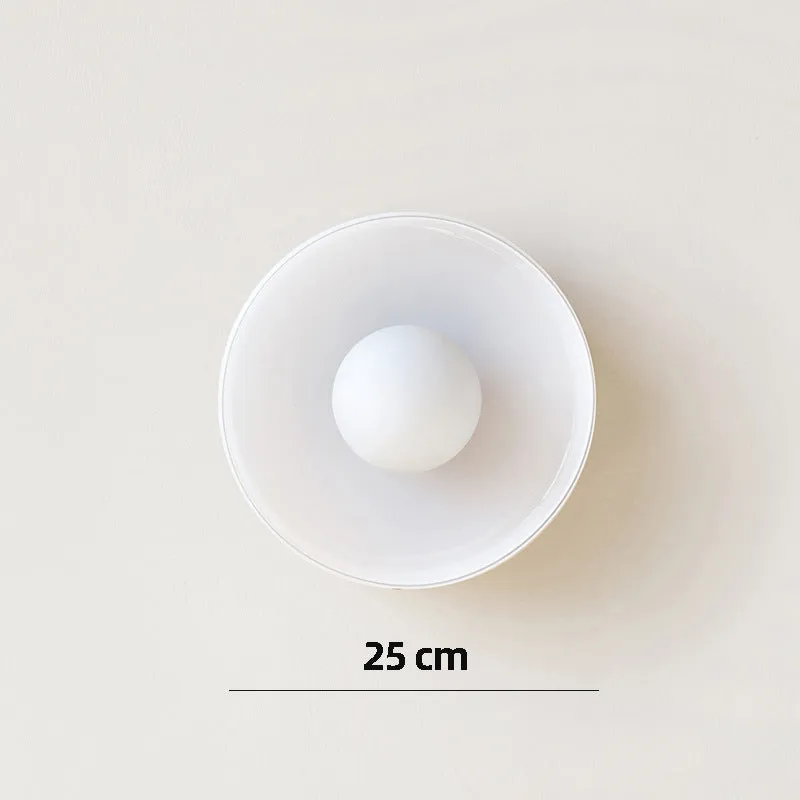 White round glass ceiling light fixture with a 25cm diameter shade.