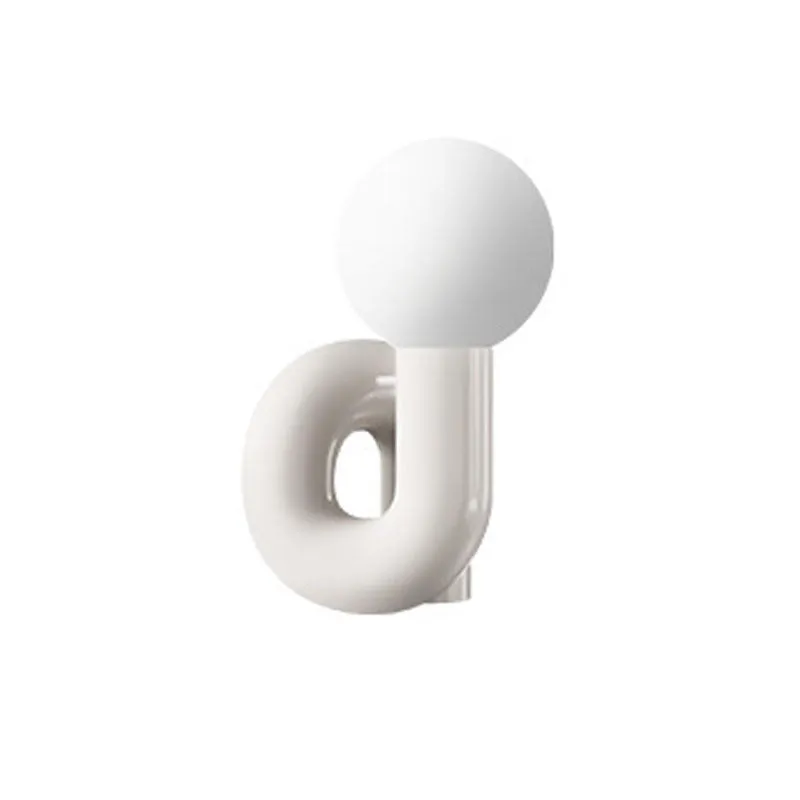 Pink and white resin bedside lamp with graphic customisation option for children's bedrooms