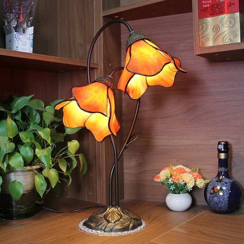 American classical desk lamp with lotus design in glass construction, available in single and double-head configurations