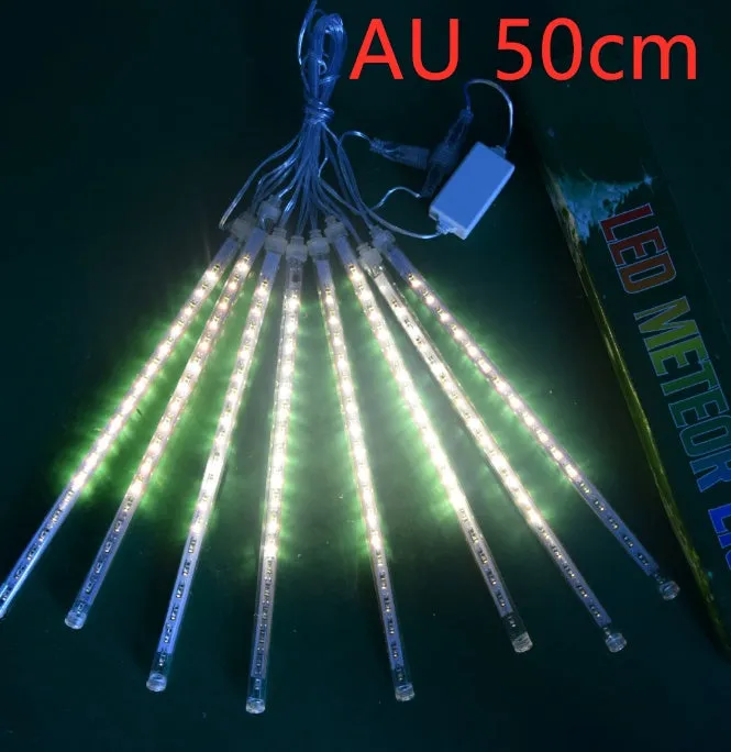 Waterproof LED meteor shower rain lights with multicolour effects in outdoor garden setting
