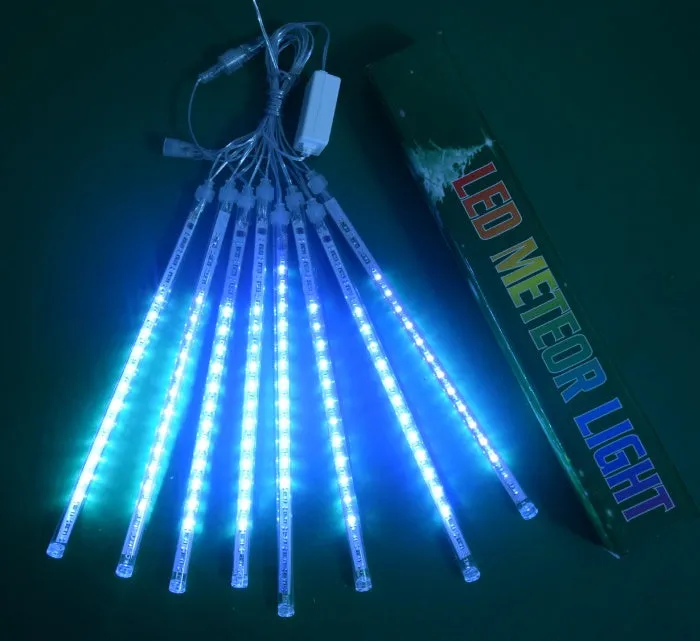 Waterproof LED meteor shower rain lights with multicolour effects in outdoor garden setting