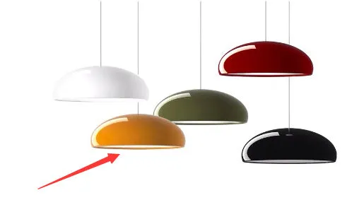 Danish iron pendant lamp in orange with adjustable cable hanging over a restaurant table.