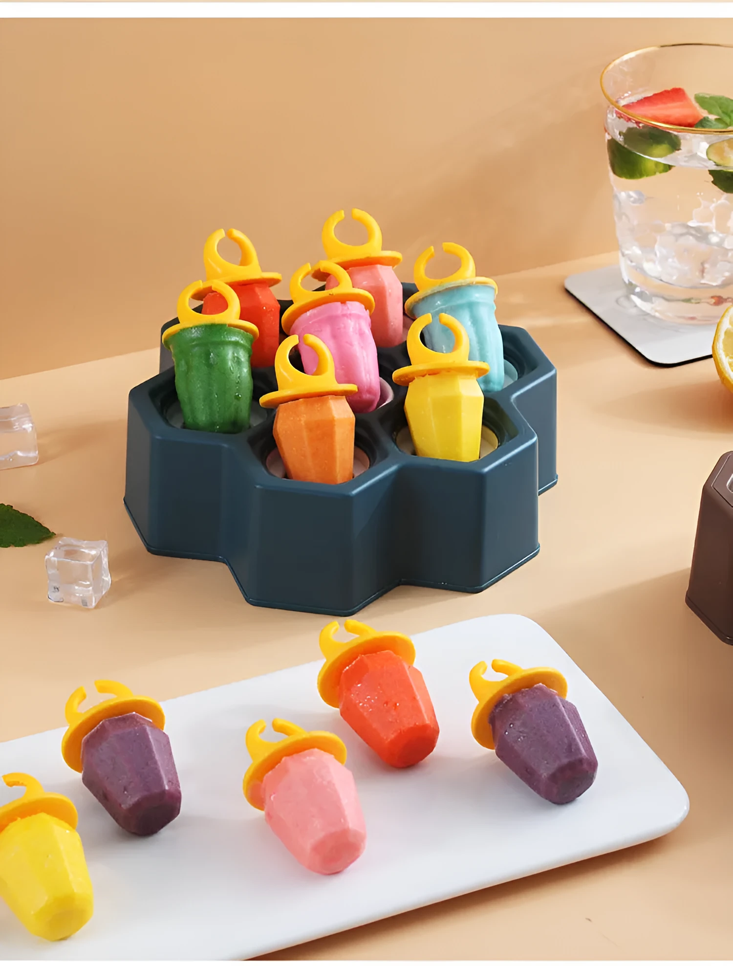 Brown plastic ice cube mold with honeycomb design and anti-drip edges