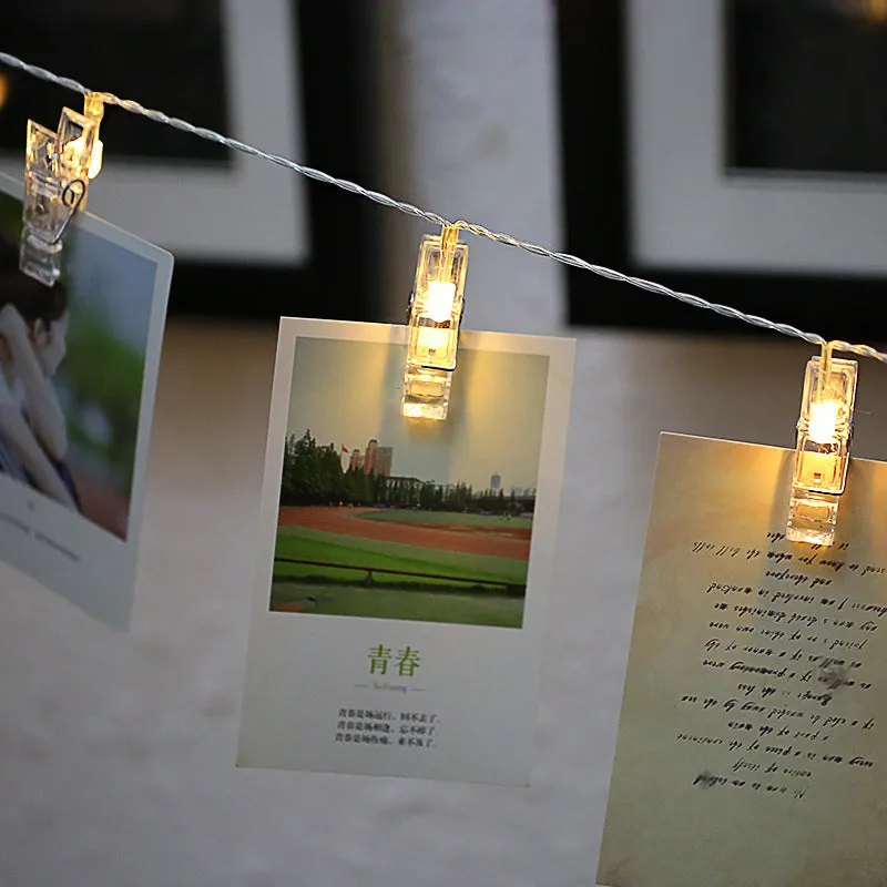 LED clip light string with heart-shaped warm white bulbs spaced 15cm apart