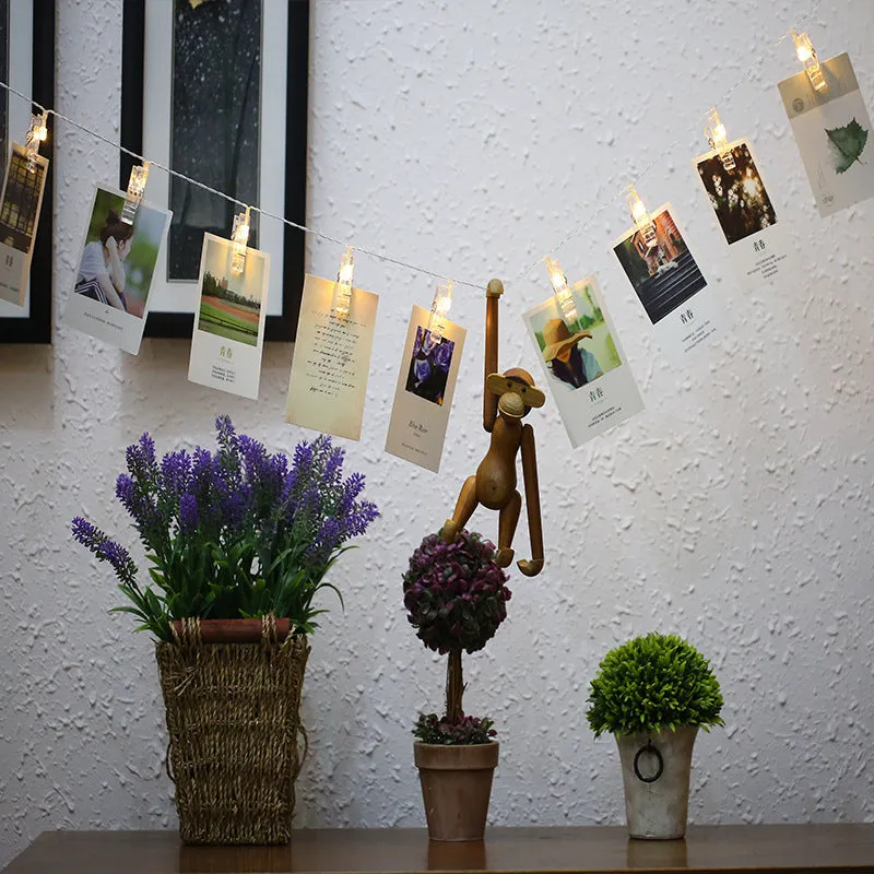 LED clip light string with heart-shaped warm white bulbs spaced 15cm apart