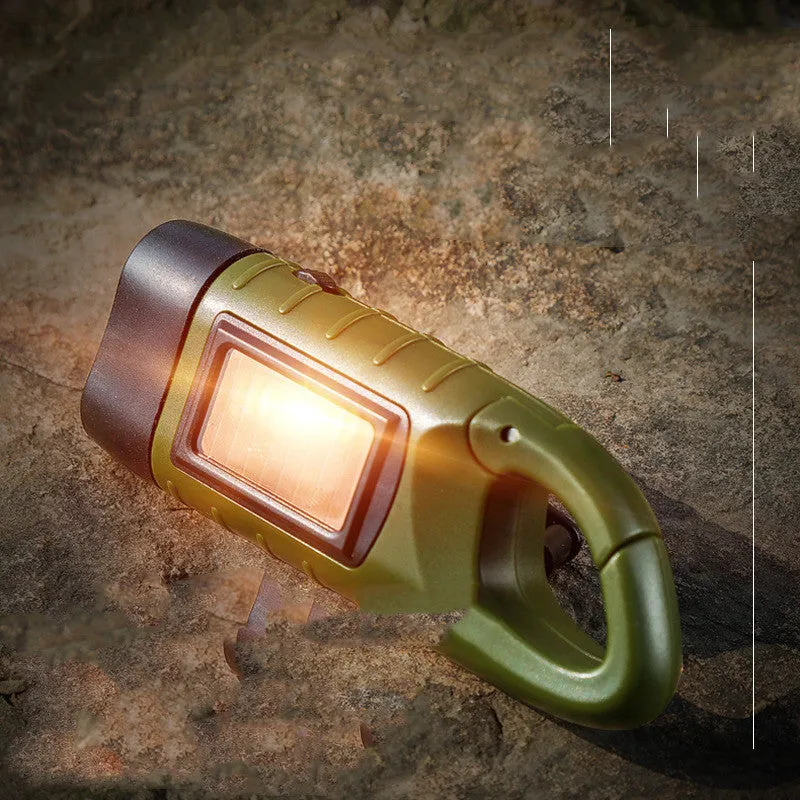 Hand-crank and solar-powered olive green LED emergency flashlight with USB charging port