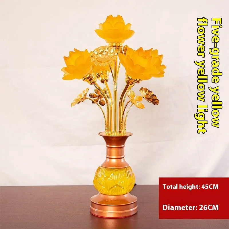 Coloured glaze pink and yellow LED lotus lantern for Buddha worship on an alloy stand.