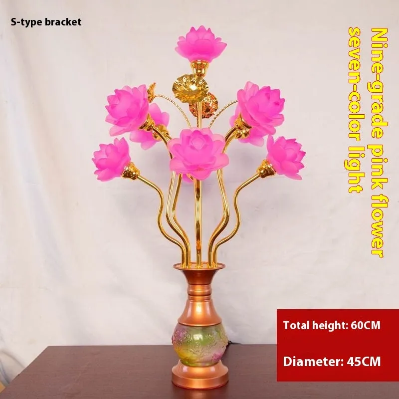 Coloured glaze pink and yellow LED lotus lantern for Buddha worship on an alloy stand.