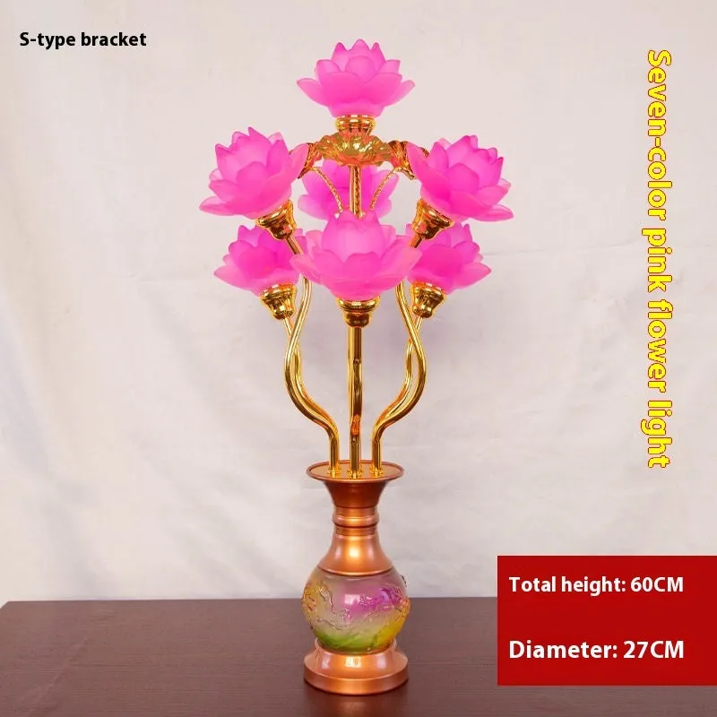 Coloured glaze pink and yellow LED lotus lantern for Buddha worship on an alloy stand.