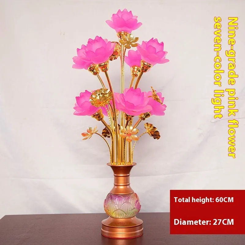 Coloured glaze pink and yellow LED lotus lantern for Buddha worship on an alloy stand.
