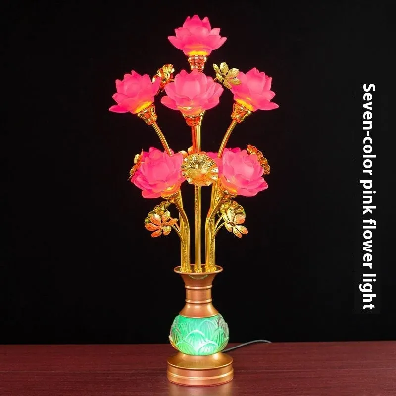 Coloured glaze pink and yellow LED lotus lantern for Buddha worship on an alloy stand.