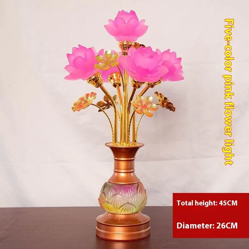 Coloured glaze pink and yellow LED lotus lantern for Buddha worship on an alloy stand.