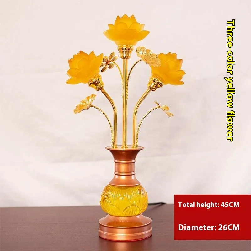 Coloured glaze pink and yellow LED lotus lantern for Buddha worship on an alloy stand.