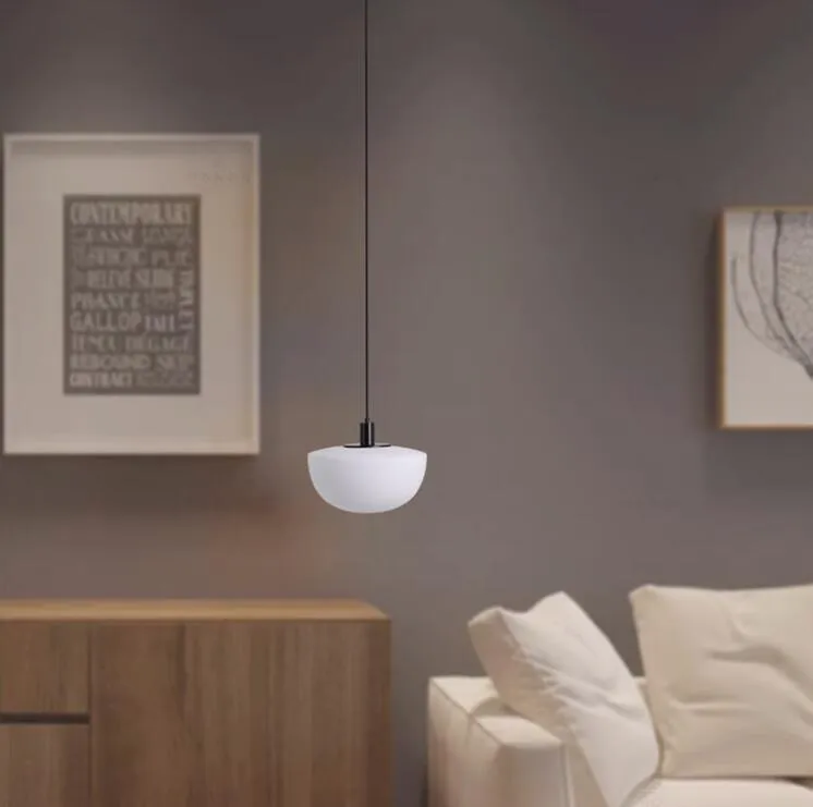 Simple modern glass pendant light with single-head droplight design in milky white finish