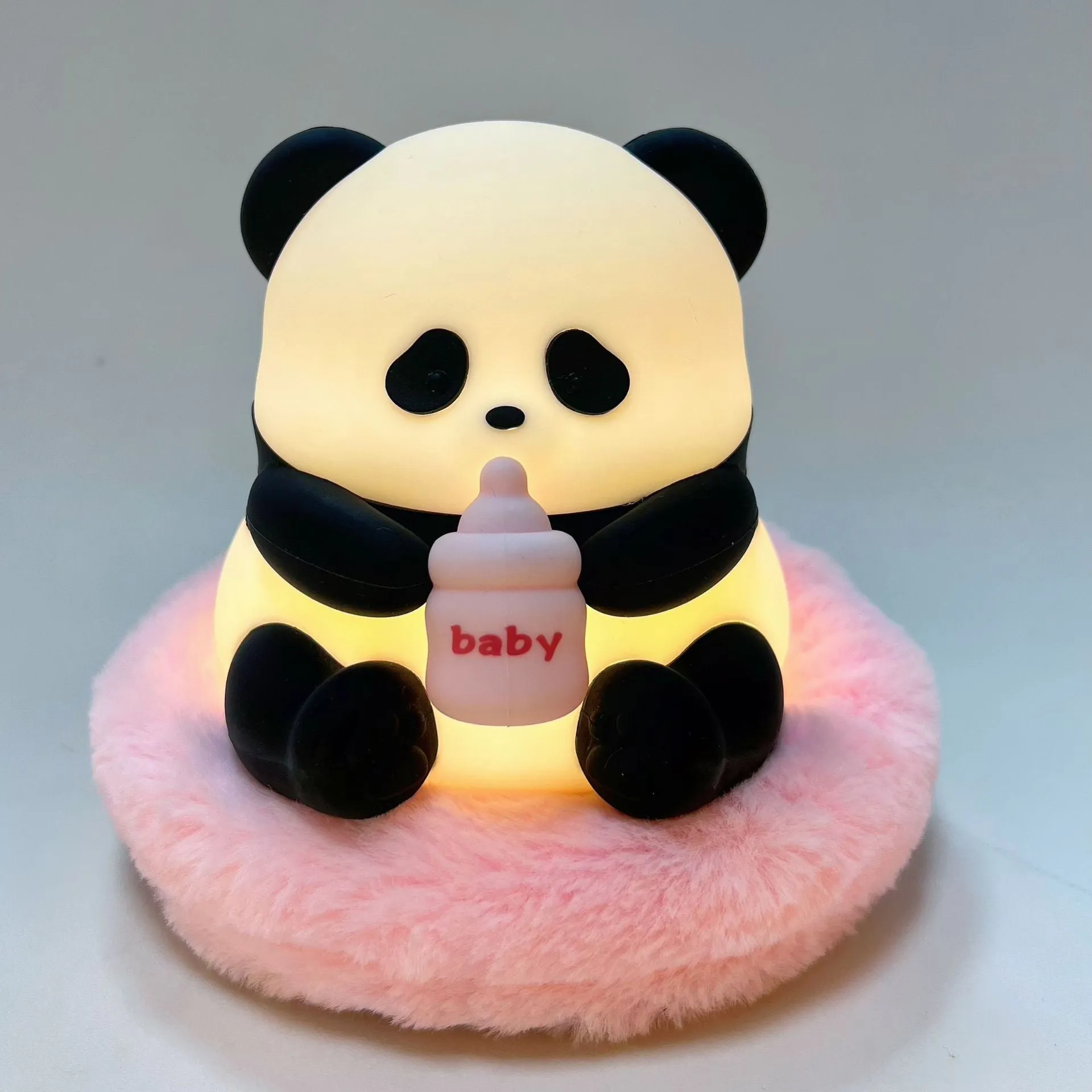 Panda silicone pat lamp with colourful light options measuring 98 × 102.29 × 104mm