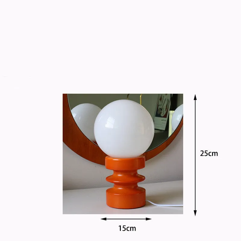 Solid wood base bedside lamp with milk glass lampshade in dark green, orange, or retro red finish.