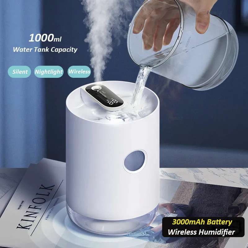Blue wireless USB humidifier with water tank on a wooden desk next to a plant.