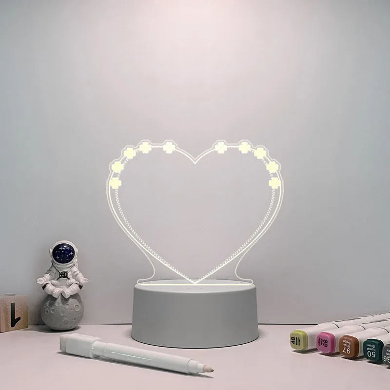 Acrylic message board night lamp with warm light showing round base and multiple picture shape options