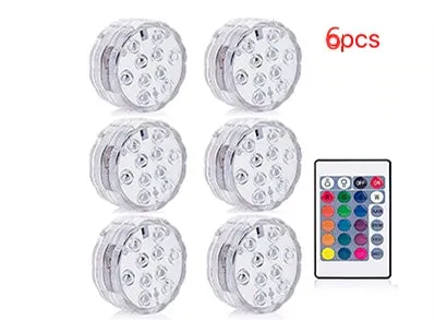 Round white battery-operated LED candle lamp suitable for submersible decoration.
