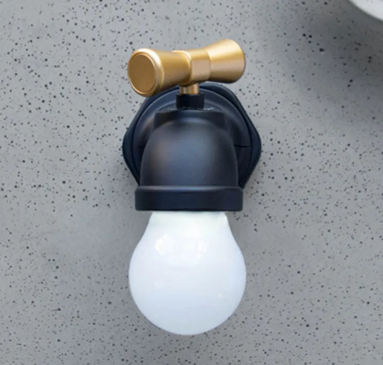 Black and white faucet-shaped USB rechargeable night lamp with sound activation feature