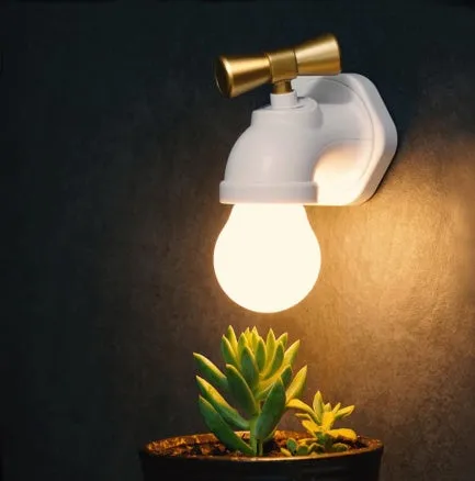 Black and white faucet-shaped USB rechargeable night lamp with sound activation feature