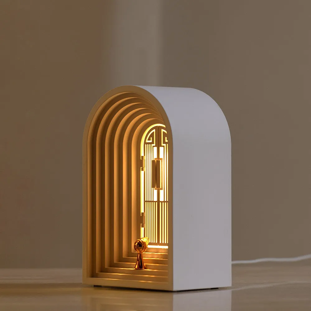 Nordic LED table lamp with Bluetooth speaker in white, plastic shade, compact bedside design