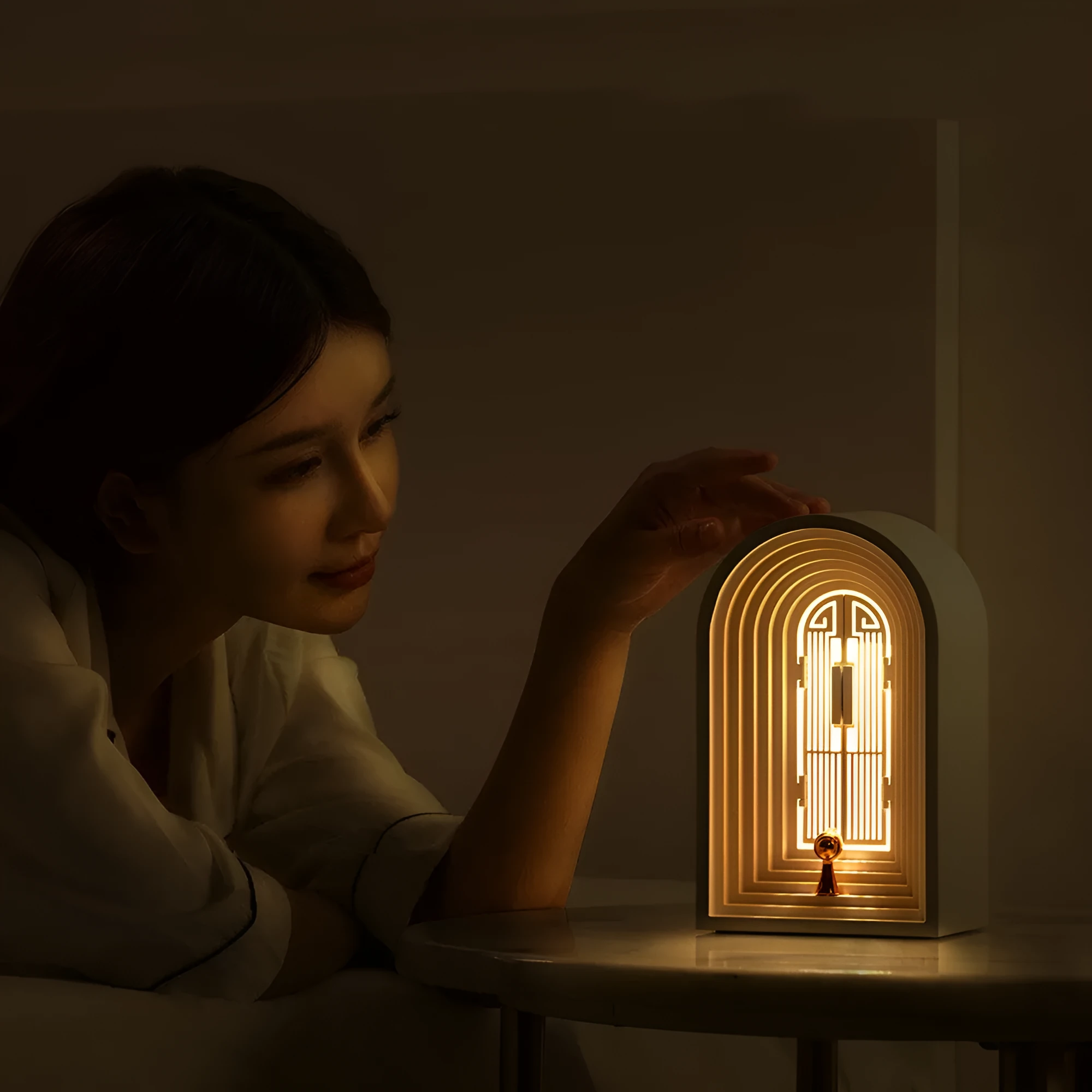 Nordic LED table lamp with Bluetooth speaker in white, plastic shade, compact bedside design