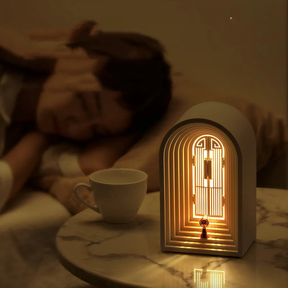Nordic LED table lamp with Bluetooth speaker in white, plastic shade, compact bedside design