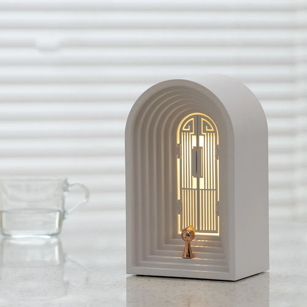 Nordic LED table lamp with Bluetooth speaker in white, plastic shade, compact bedside design
