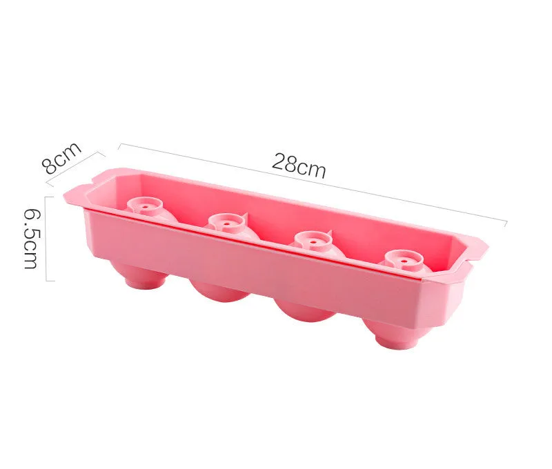 Flexible silicone ice tray showing large ice hockey, pentagon, and spherical mould designs in light blue.