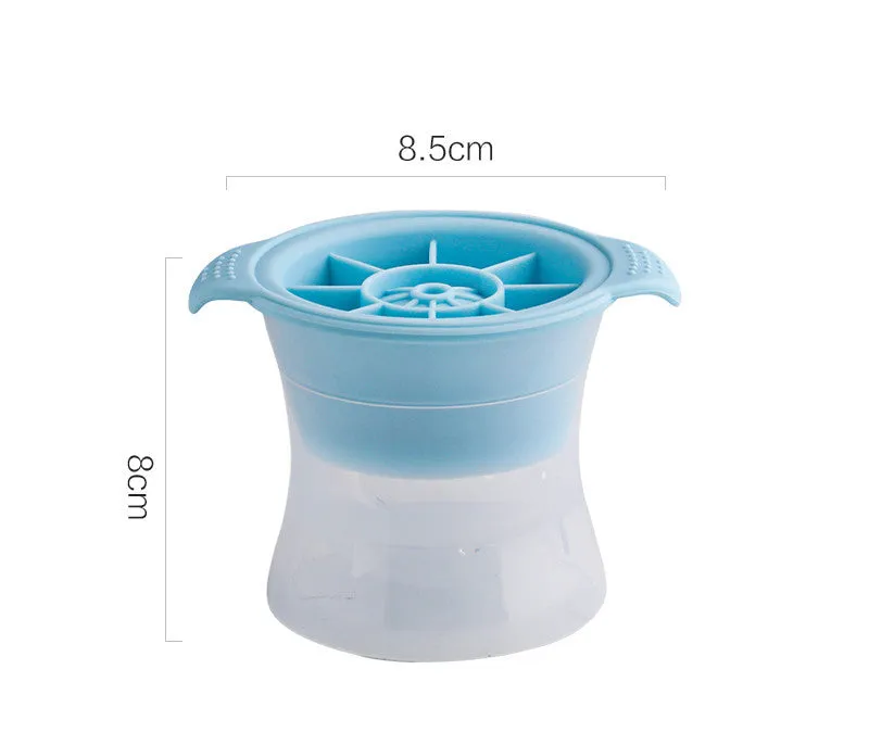 Flexible silicone ice tray showing large ice hockey, pentagon, and spherical mould designs in light blue.