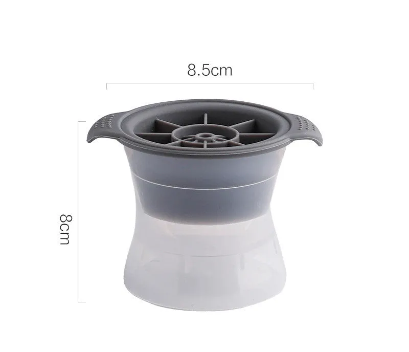 Flexible silicone ice tray showing large ice hockey, pentagon, and spherical mould designs in light blue.