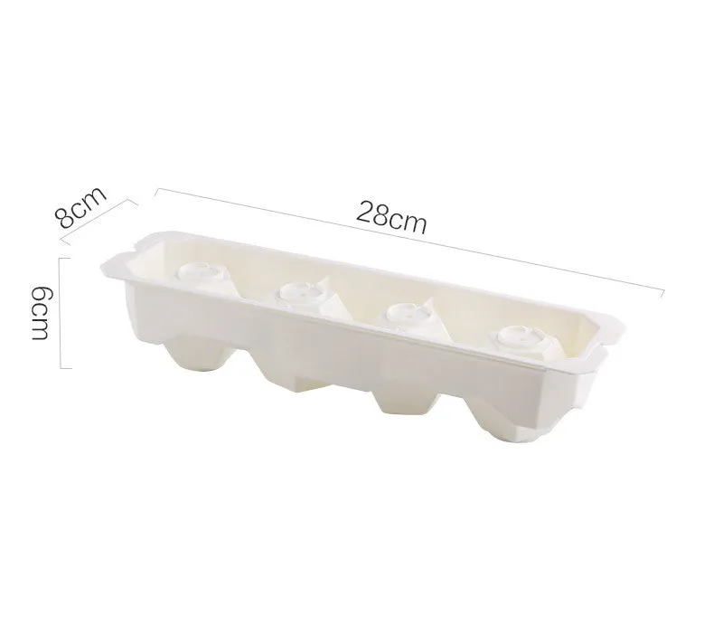 Flexible silicone ice tray showing large ice hockey, pentagon, and spherical mould designs in light blue.