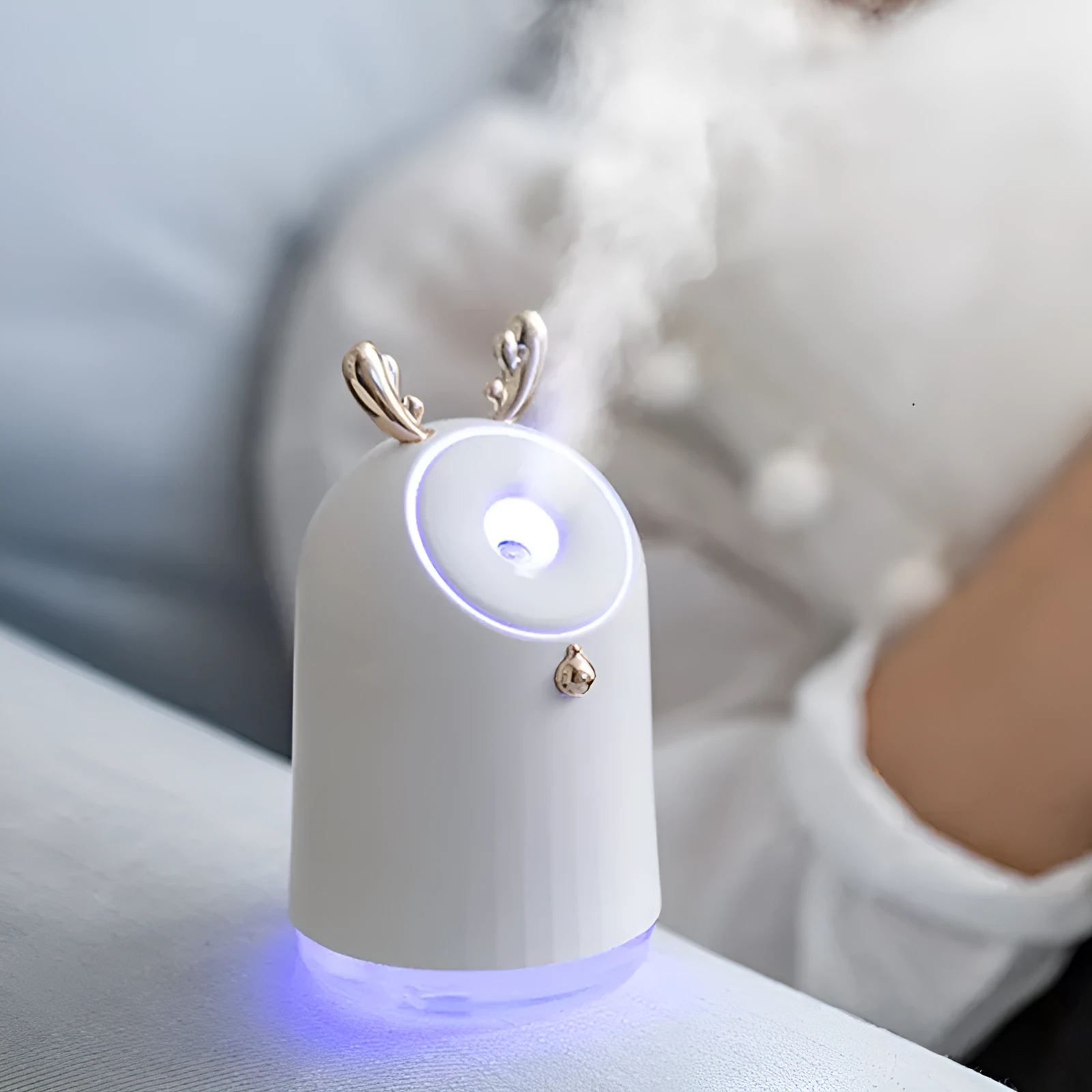 Compact USB humidifier table lamp with 250ml water tank, 145mm height, available in blue colour, sitting on a desk