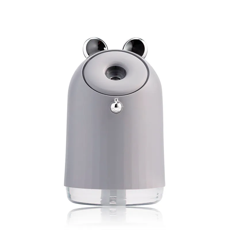 Compact USB humidifier table lamp with 250ml water tank, 145mm height, available in blue colour, sitting on a desk