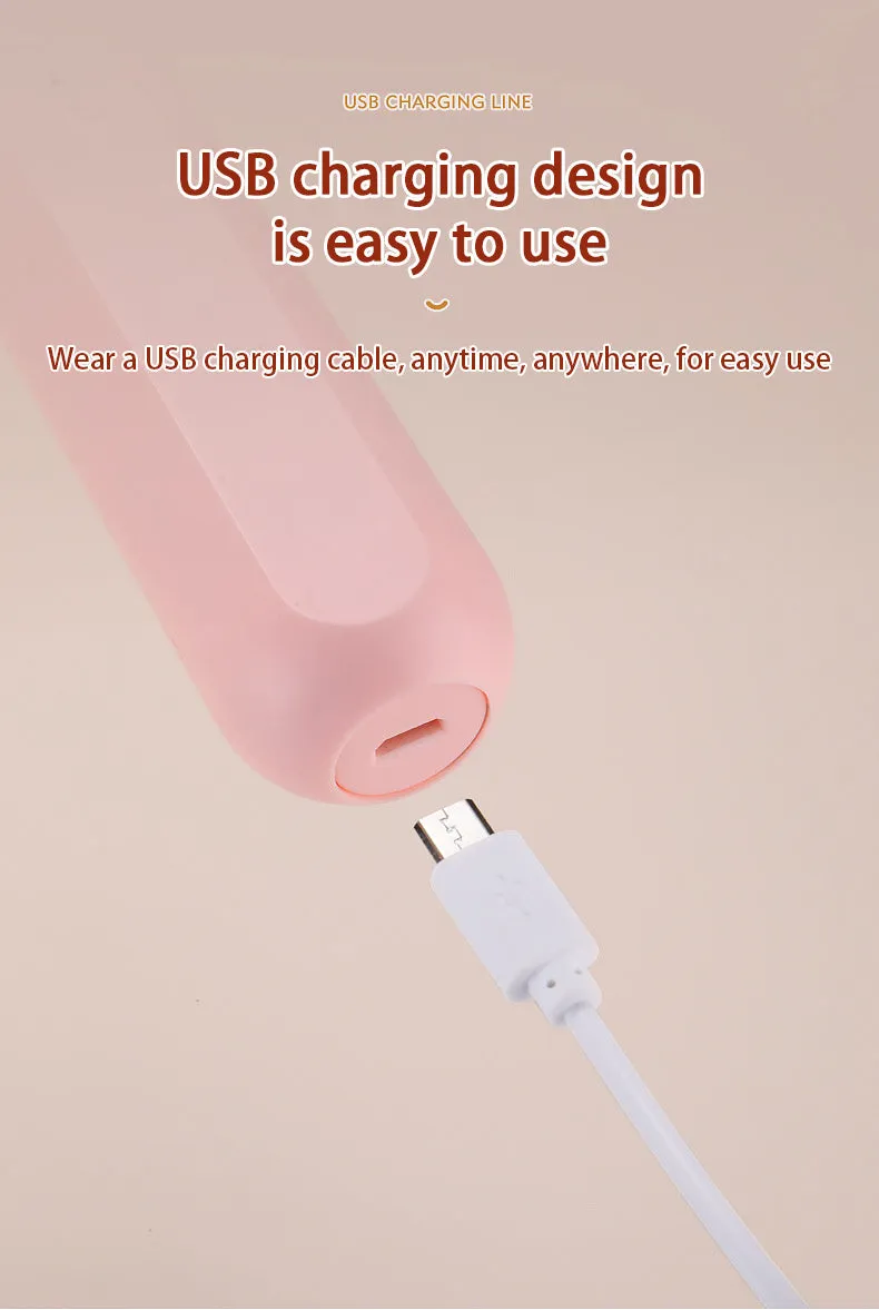 Hand-held wireless electric whisk in black and pink, with straight handle and stainless steel whisk attachment