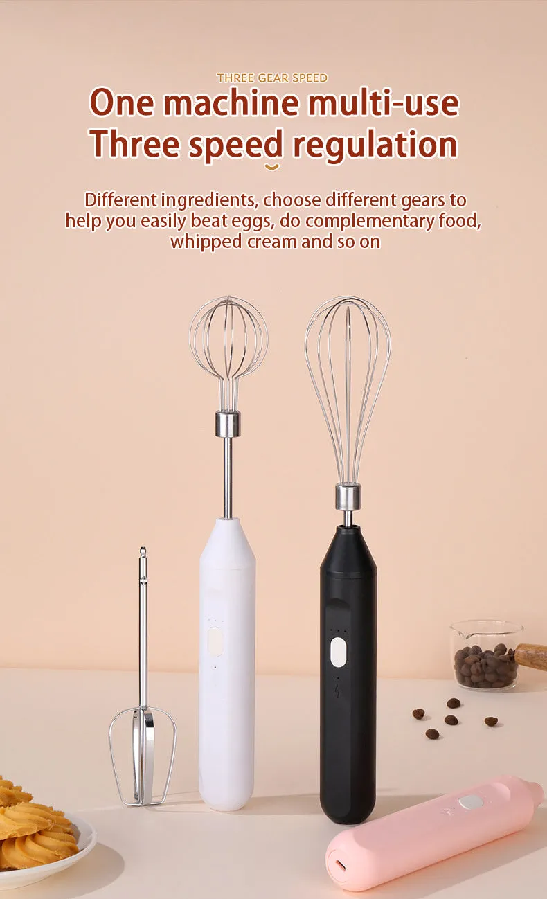 Hand-held wireless electric whisk in black and pink, with straight handle and stainless steel whisk attachment