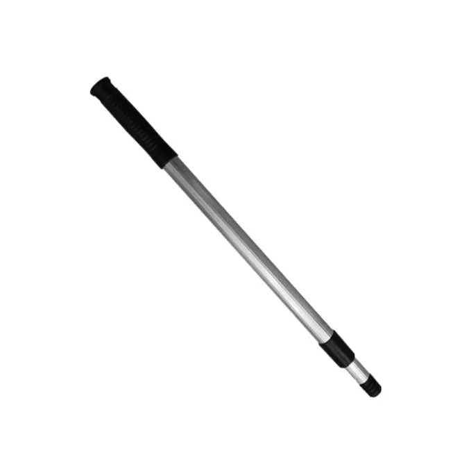 Manual weed puller set with telescopic rod, gap weeder head, and sickle weeder on a garden lawn