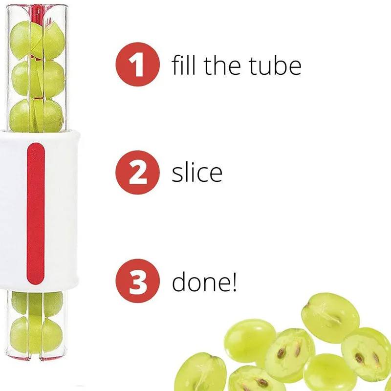 Handheld tomato and grape slicer in green with concealed stainless steel blade on a white background