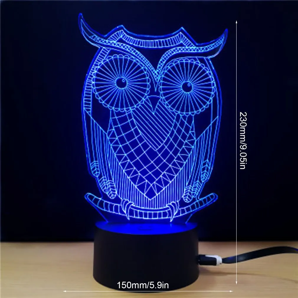 Black LED owl cartoon night light with colourful touch-switch and acrylic shade on a table