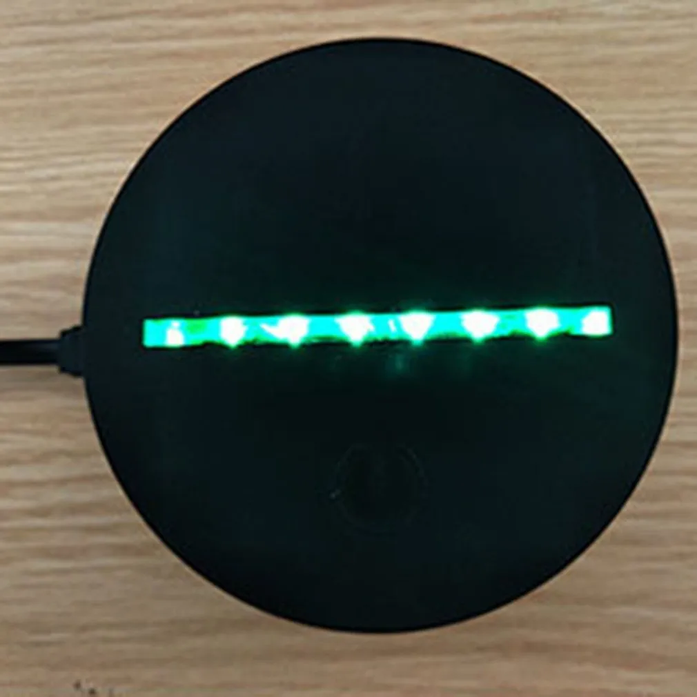 Black LED owl cartoon night light with colourful touch-switch and acrylic shade on a table