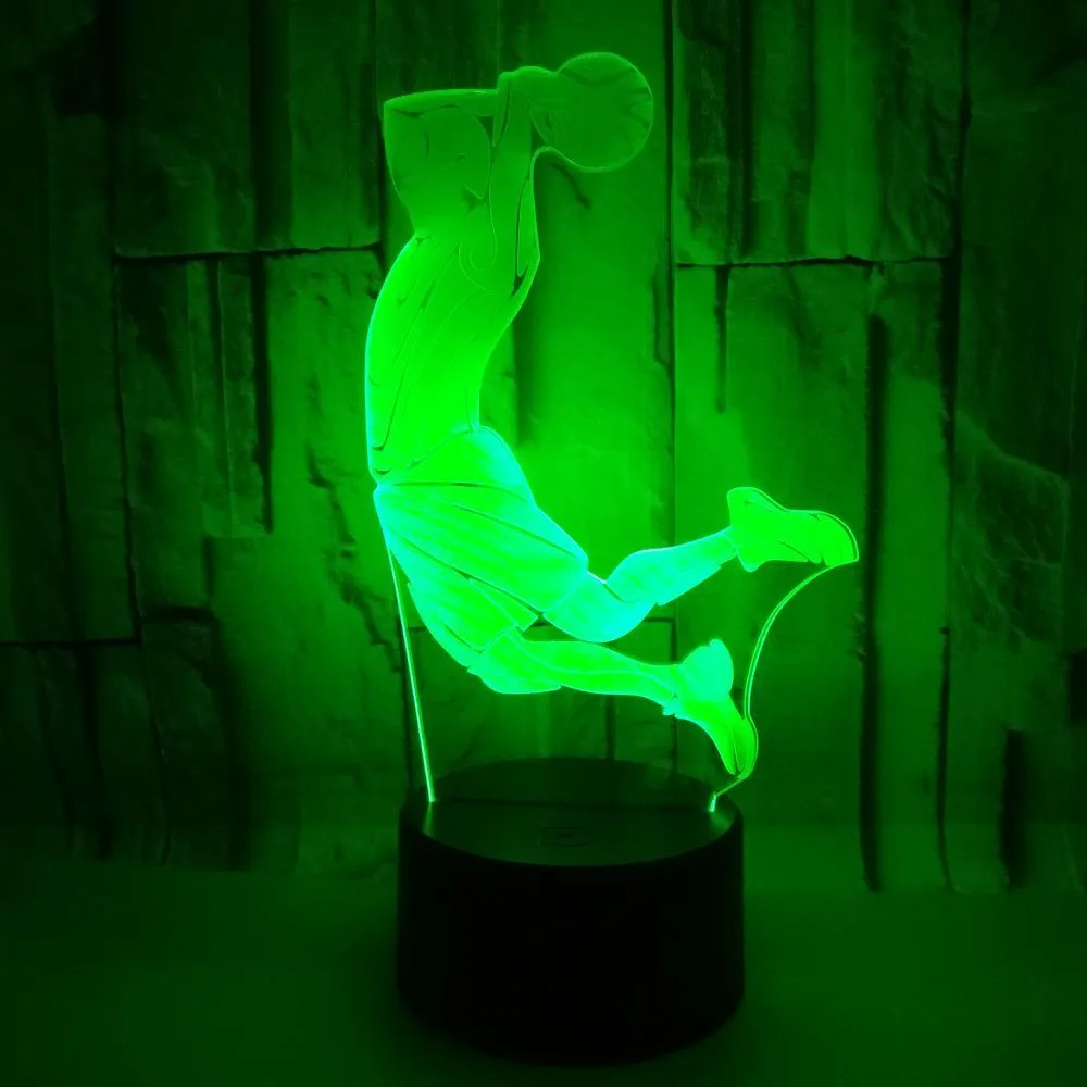 Shooting 3D night light in black with remote control showing seven colour options including red, green, blue