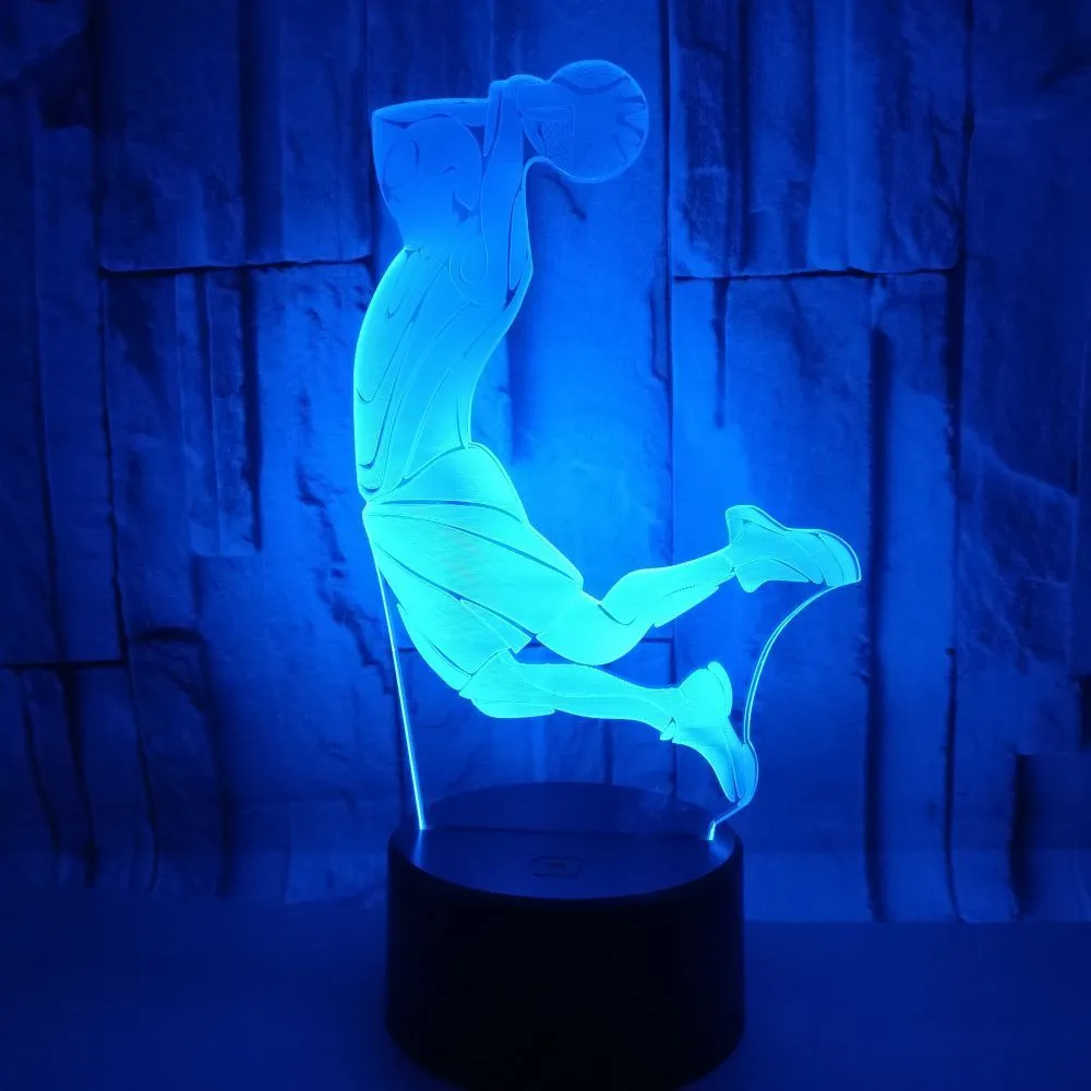 Shooting 3D night light in black with remote control showing seven colour options including red, green, blue
