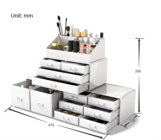 Acrylic three-layer cosmetics storage box in transparent finish with organised compartments on a dressing table