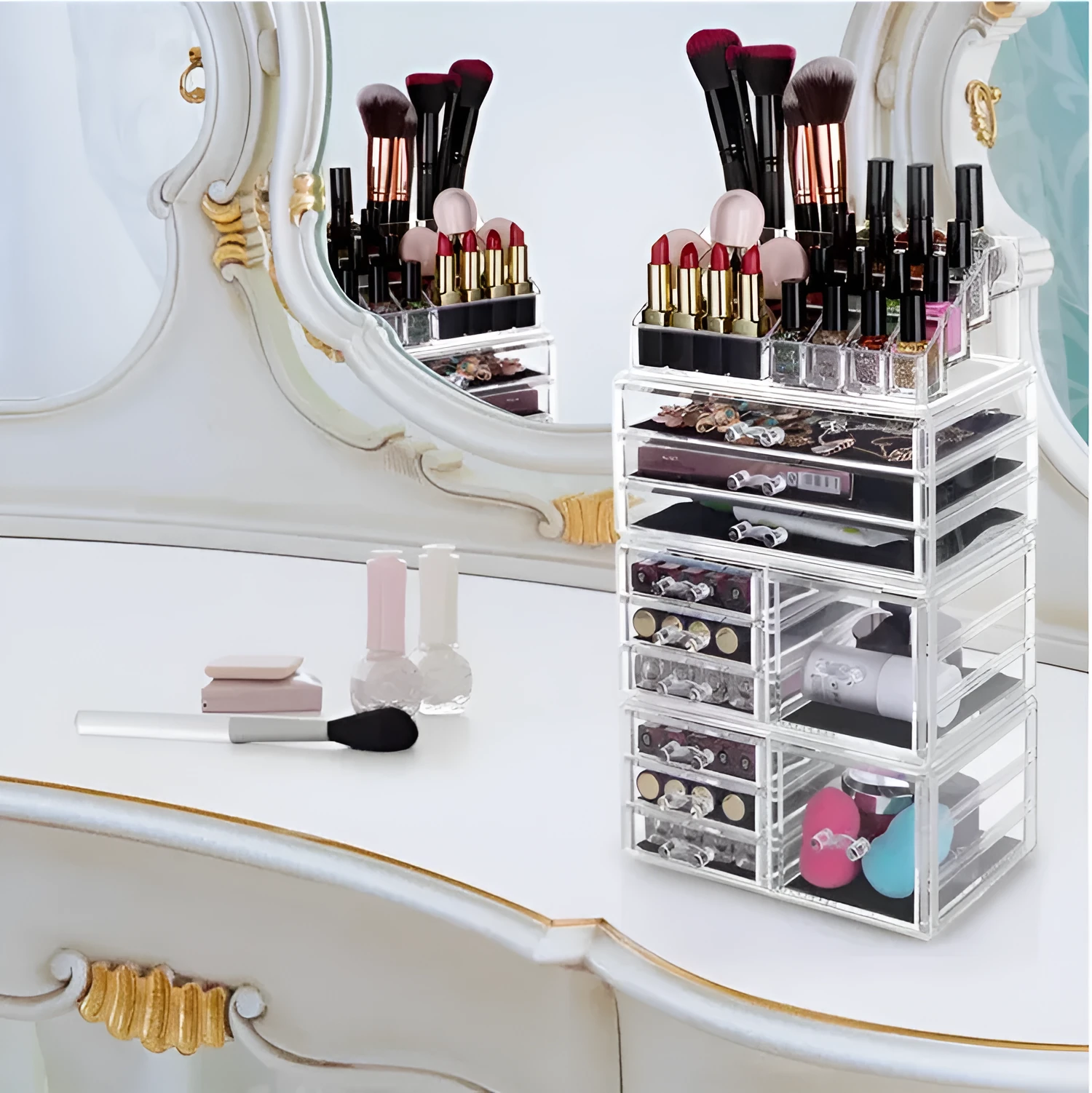 Acrylic three-layer cosmetics storage box in transparent finish with organised compartments on a dressing table